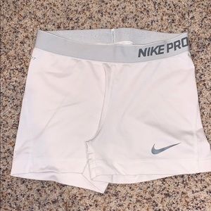 White women’s Nike dri fit spandex size M